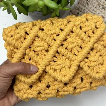 Detail of a mustard crochet stitch pattern made by hand